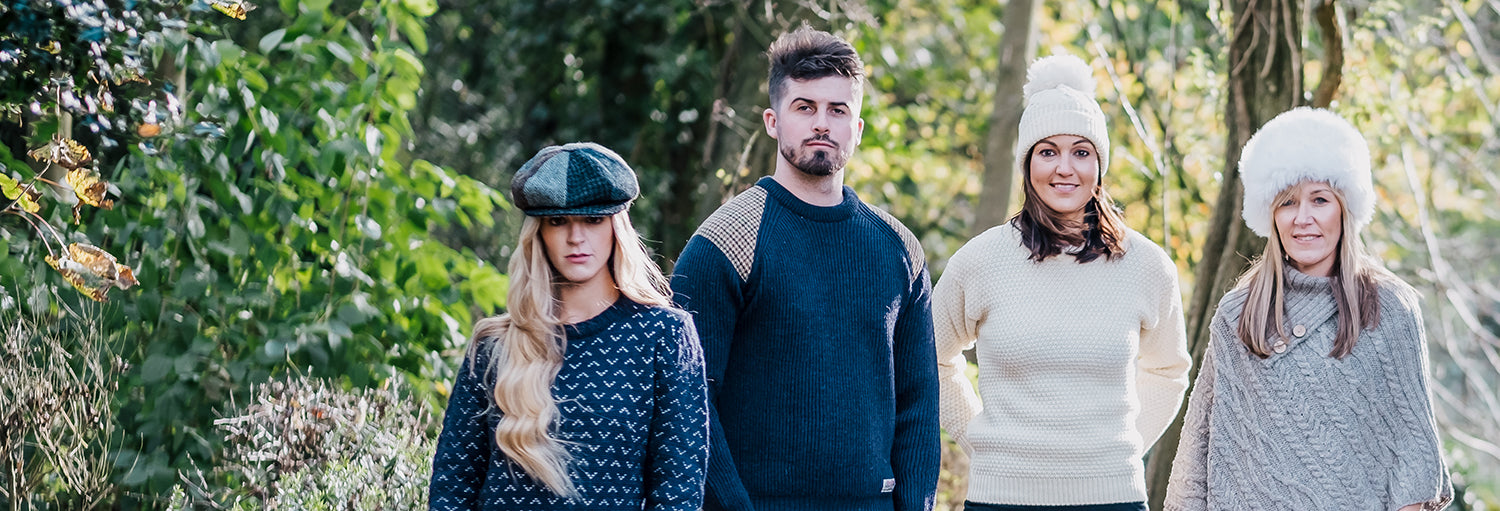 Models wearing wool jumpers and hats