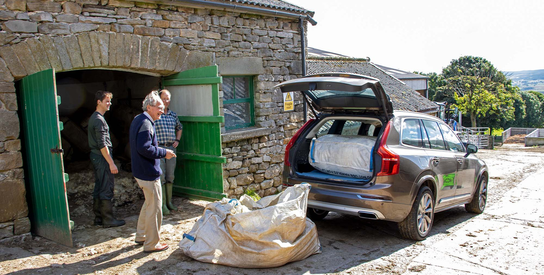 Loading wool into a Volvo