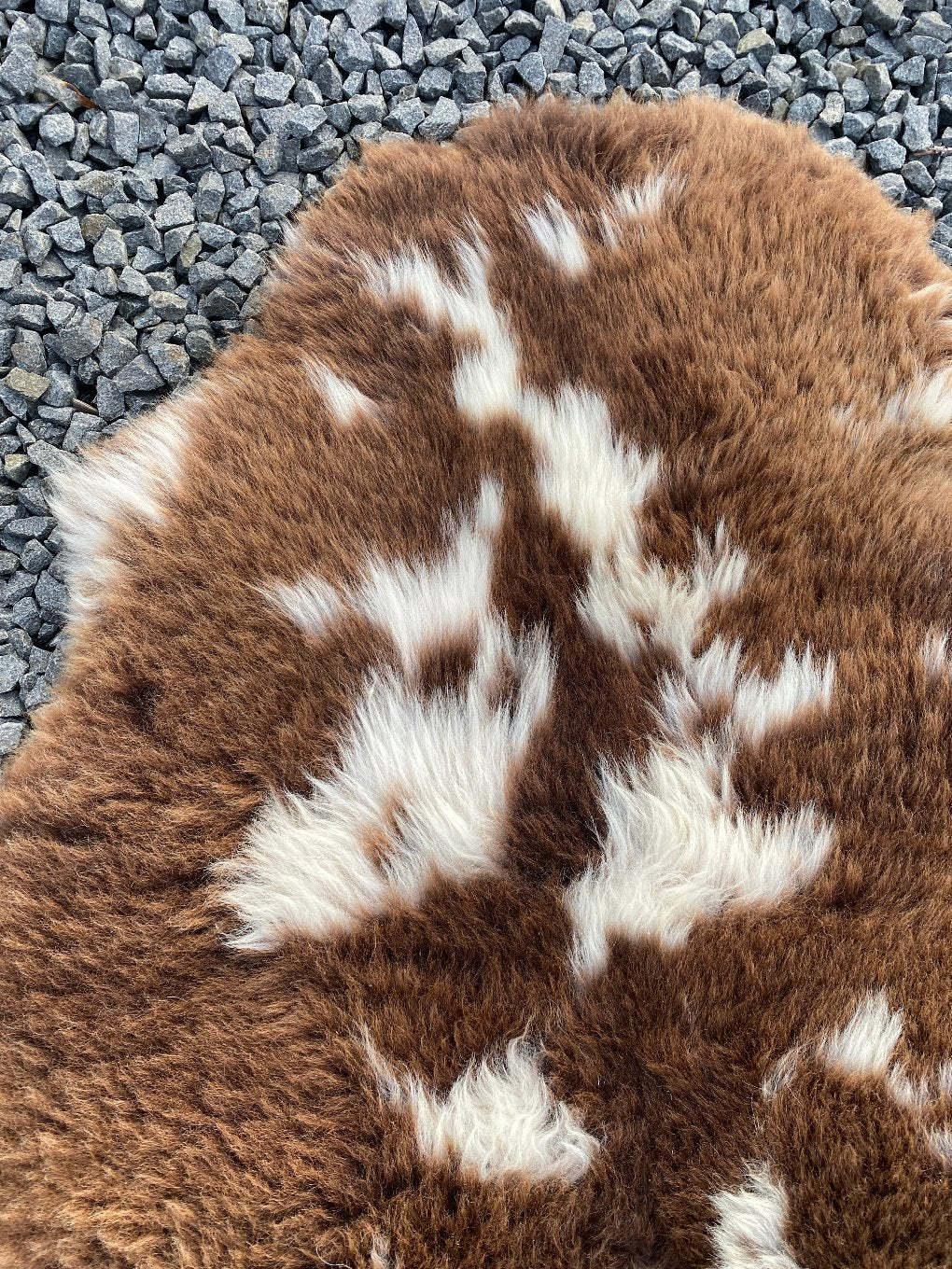 Brown and cream sheepskin rug close up