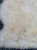 Cream sheepskin rug close up