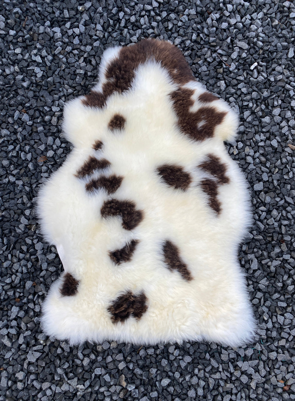 Cream and brown spotty sheepskin rug 