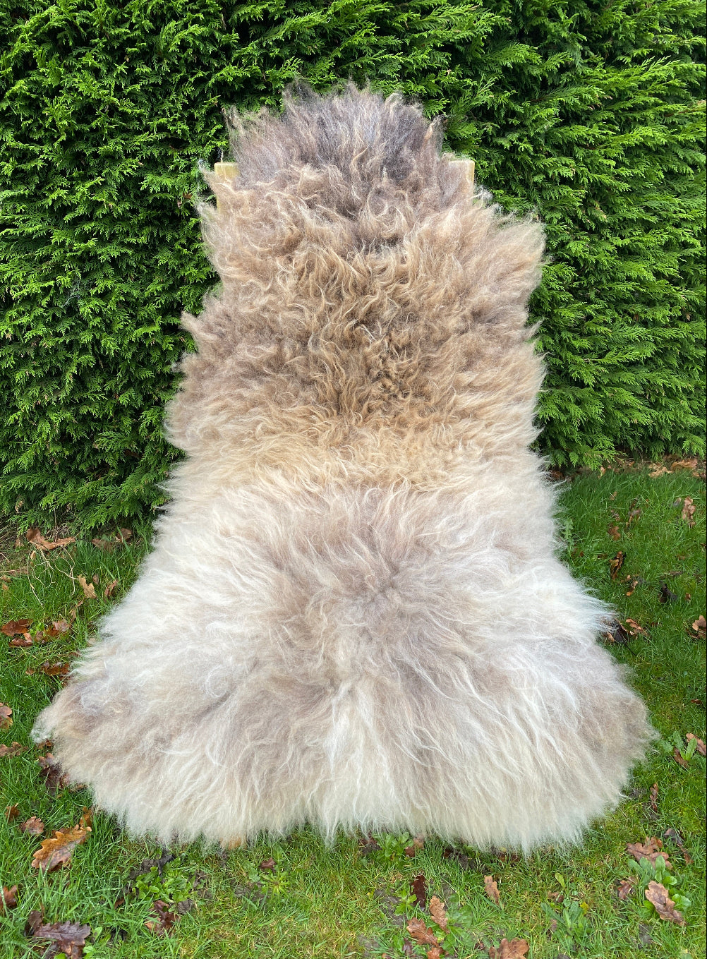 Brown sheepskin rug on chair