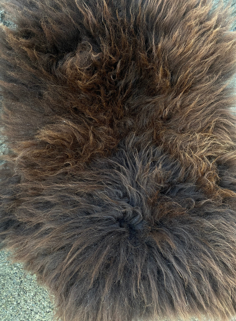 Brown sheepskin rug close up 