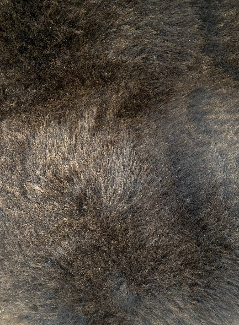 Brown sheepskin rug close up