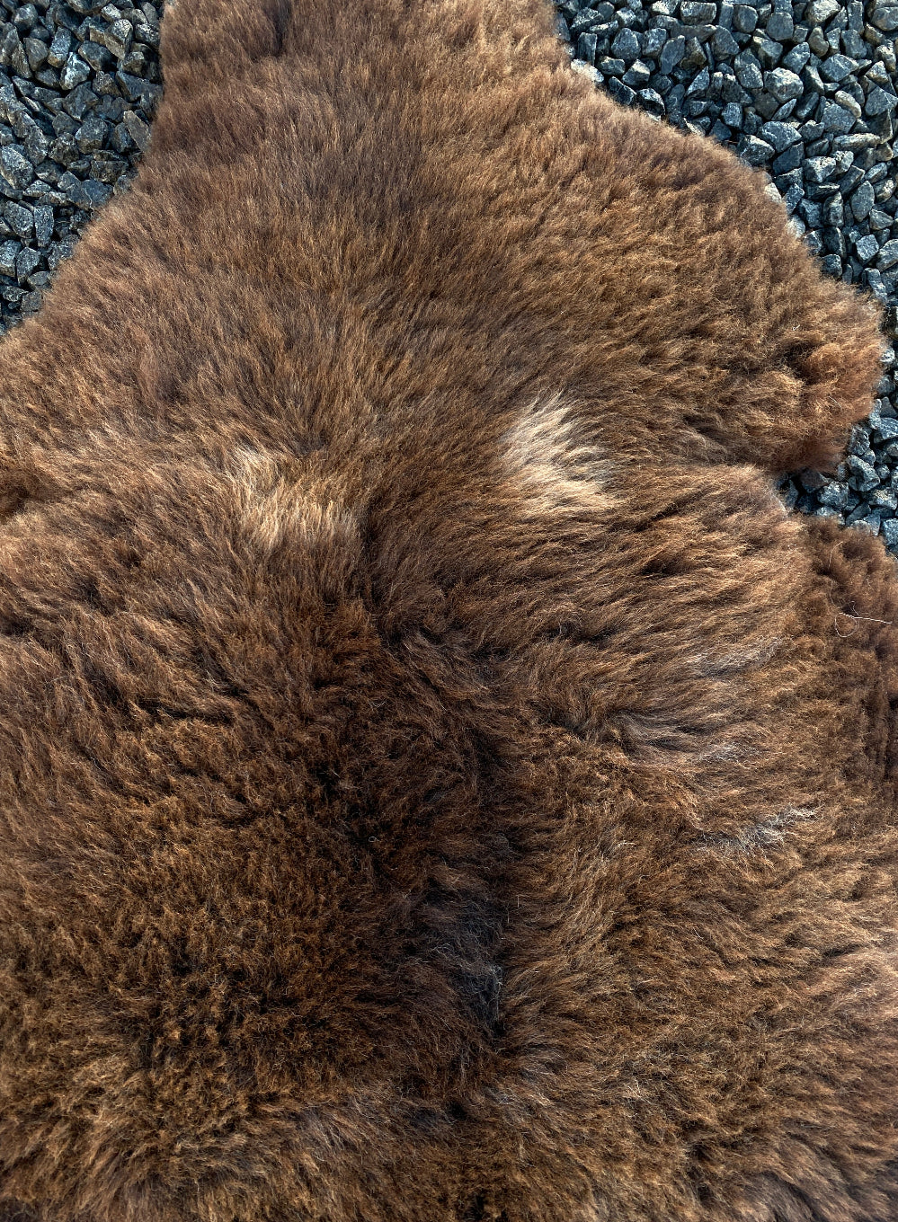 Brown sheepskin rug close up