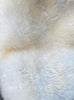 cream sheepskin rug close up