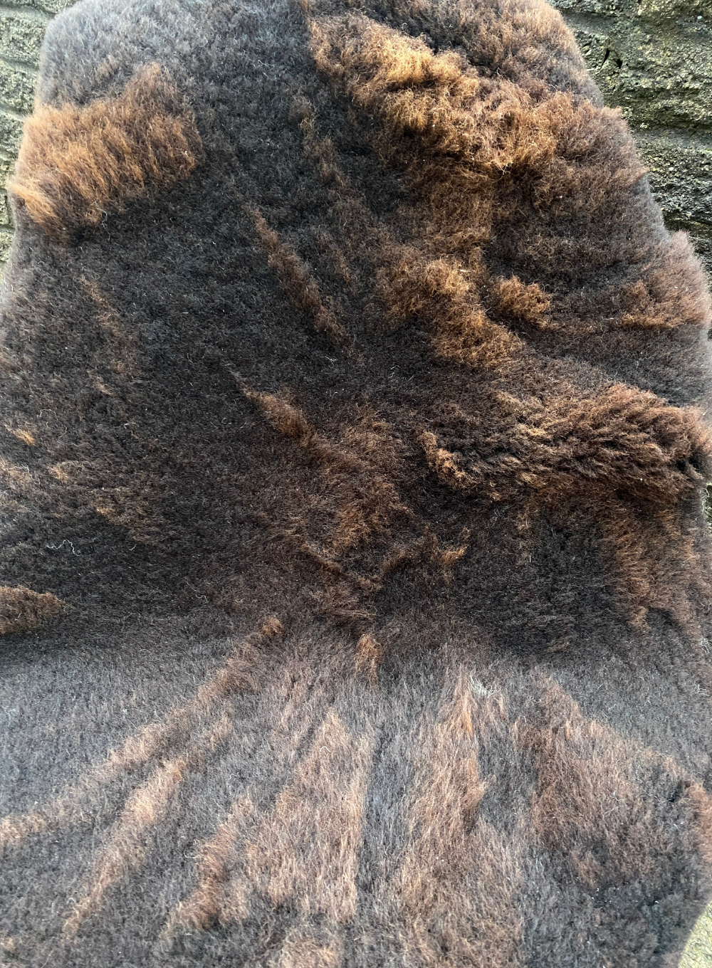 Brown sheepskin rug close up