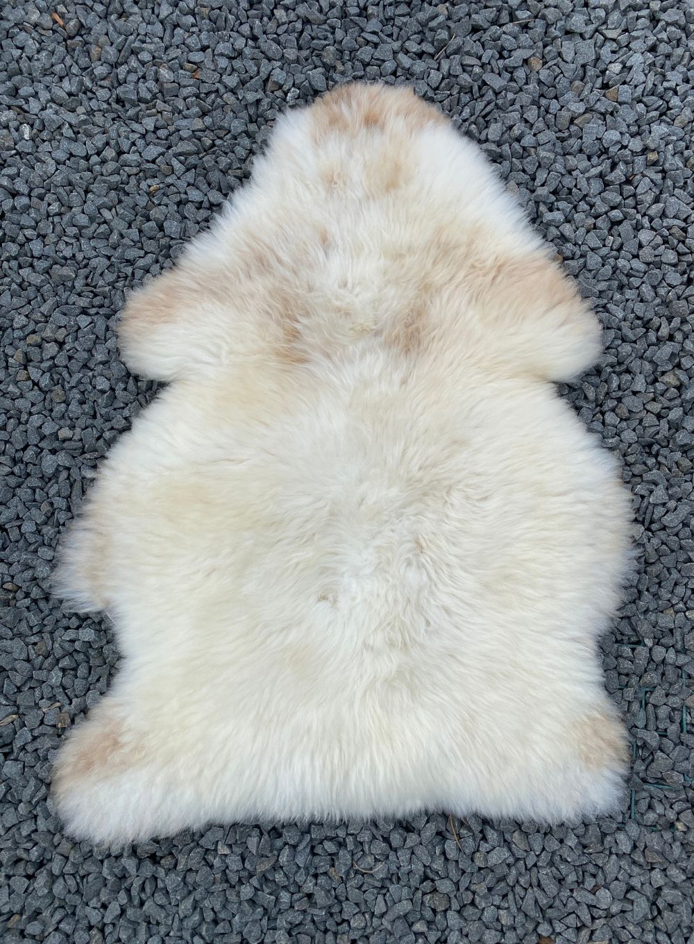 Cream speckled sheepskin rug 