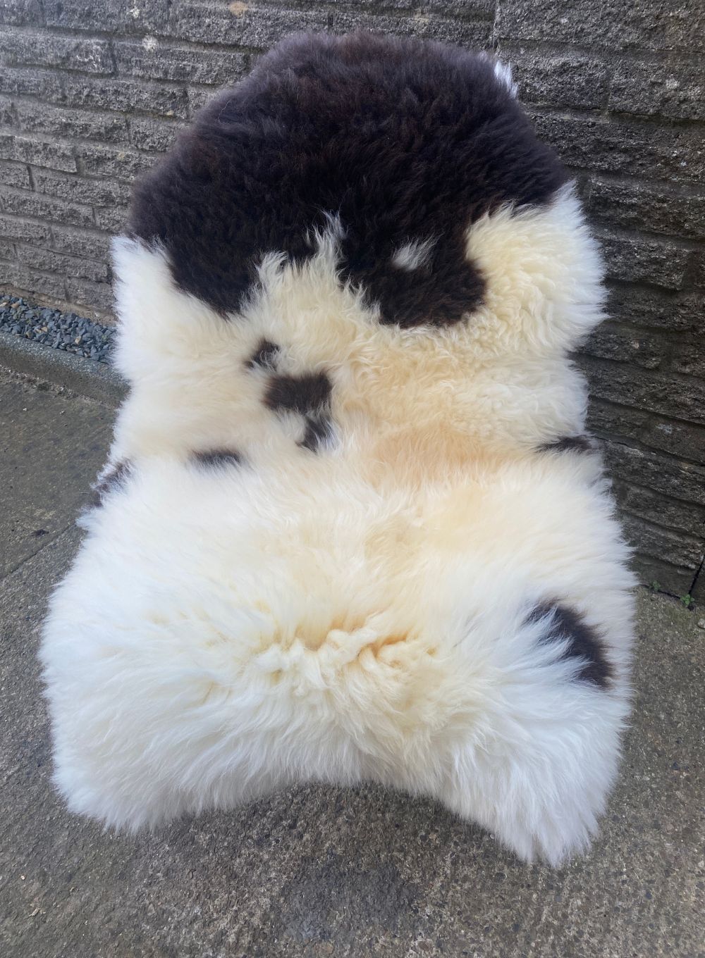 Cream and brown sheepskin rug 
