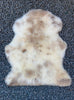 Cream speckled sheepskin rug flat 