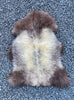 Brown and grey sheepskin rug flat
