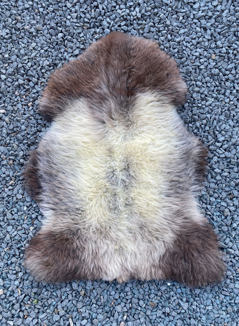 Brown and grey sheepskin rug flat