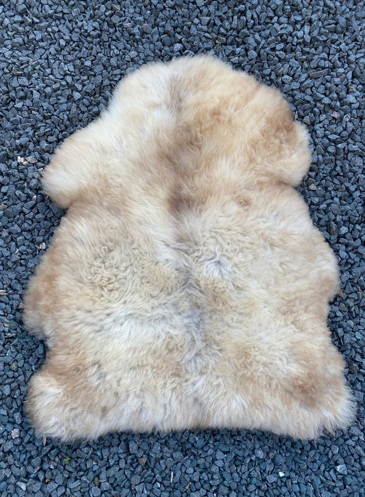 Cream speckled sheepskin rug 