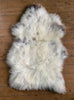 Cream speckled sheepskin laid flat