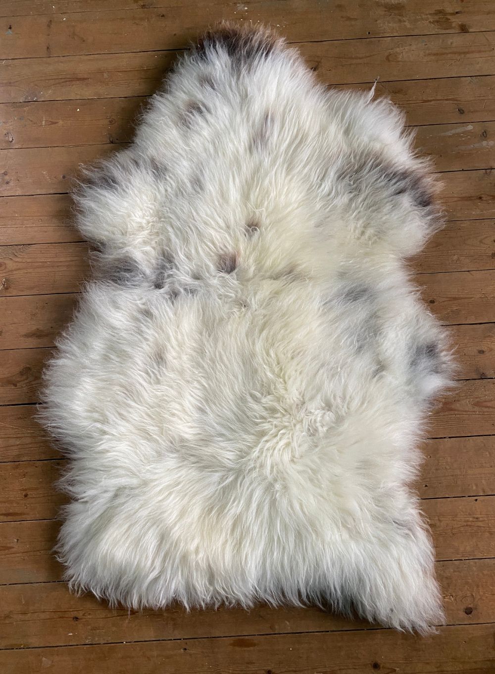 Cream speckled sheepskin laid flat