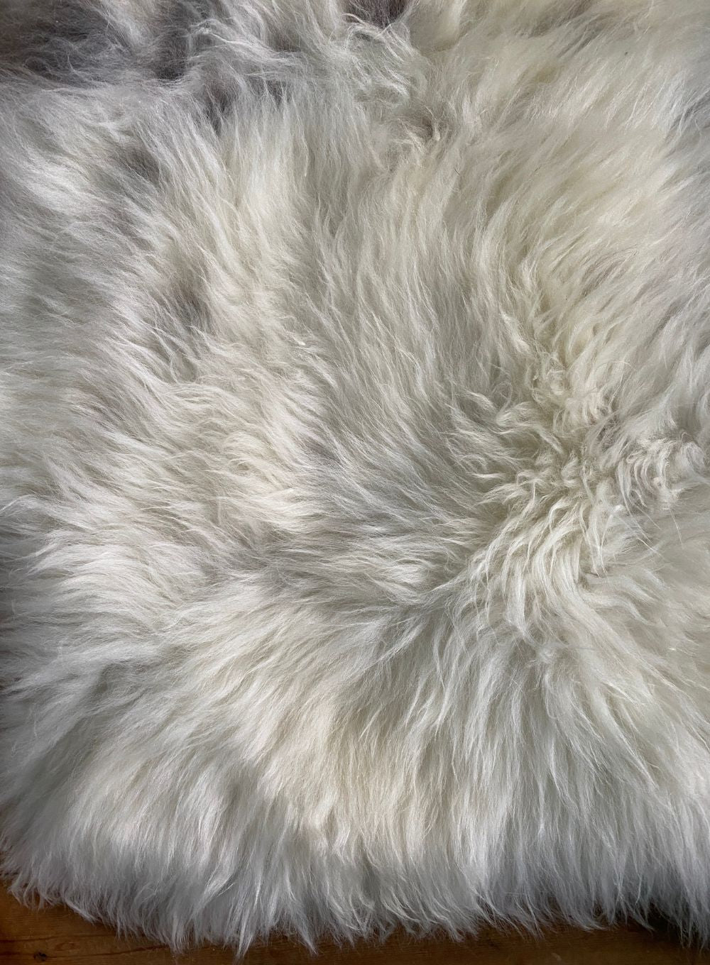 Cream speckled sheepskin close up 
