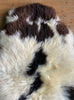 Brown and cream sheepskin rug close up