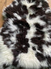 Brown and cream spotty sheepskin close up