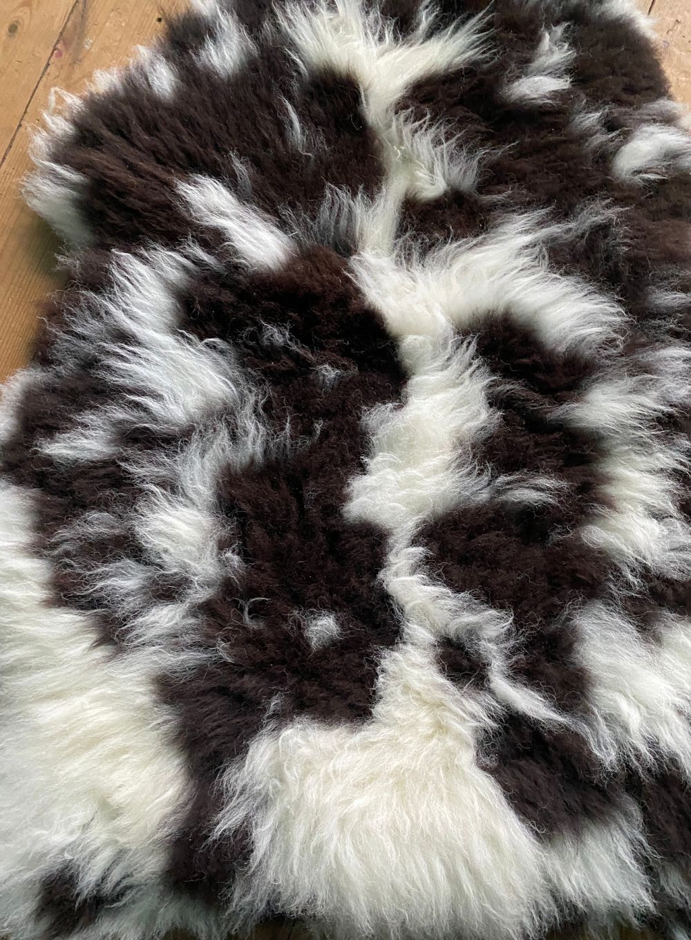 Brown and cream spotty sheepskin close up