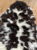 Brown and cream spotty sheepskin close up