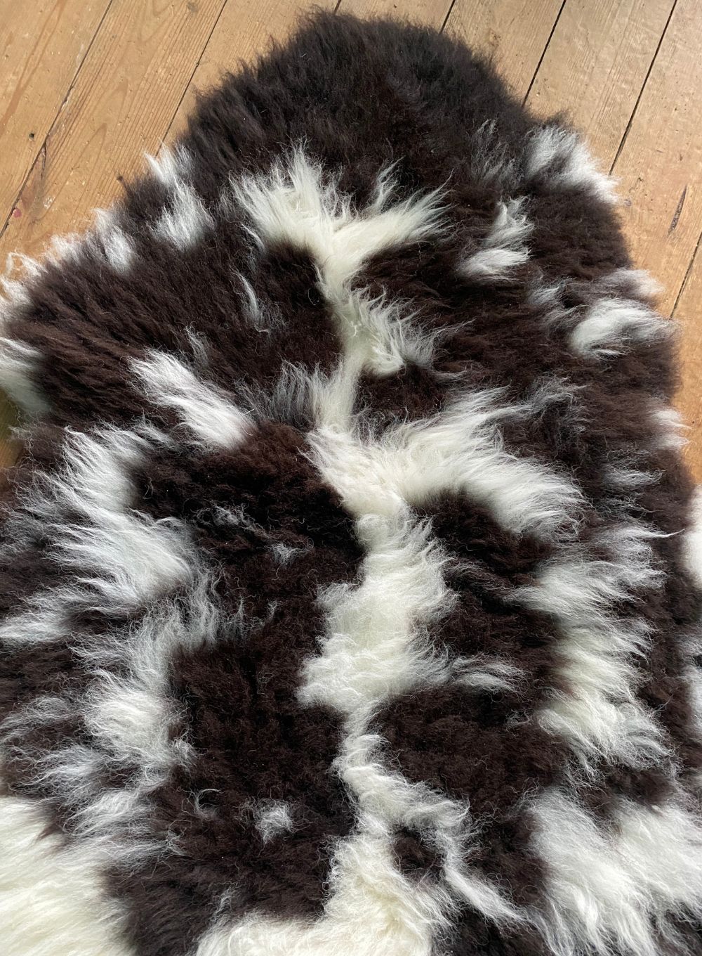 Brown and cream spotty sheepskin close up