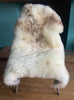 Cream speckled sheepskin rug
