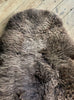 Brown sheepskin rug close up