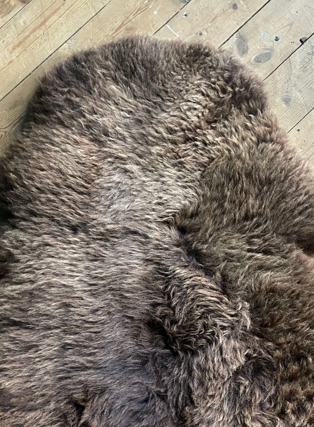 Brown sheepskin rug close up