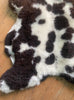 Brown and cream sheepskin rug close up 