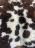 Brown and cream sheepskin rug close up 