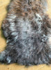Brown sheepskin rug close up