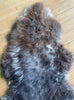 Brown sheepskin rug close up