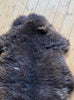 Brown sheepskin rug close up