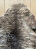 Brown sheepskin rug close up