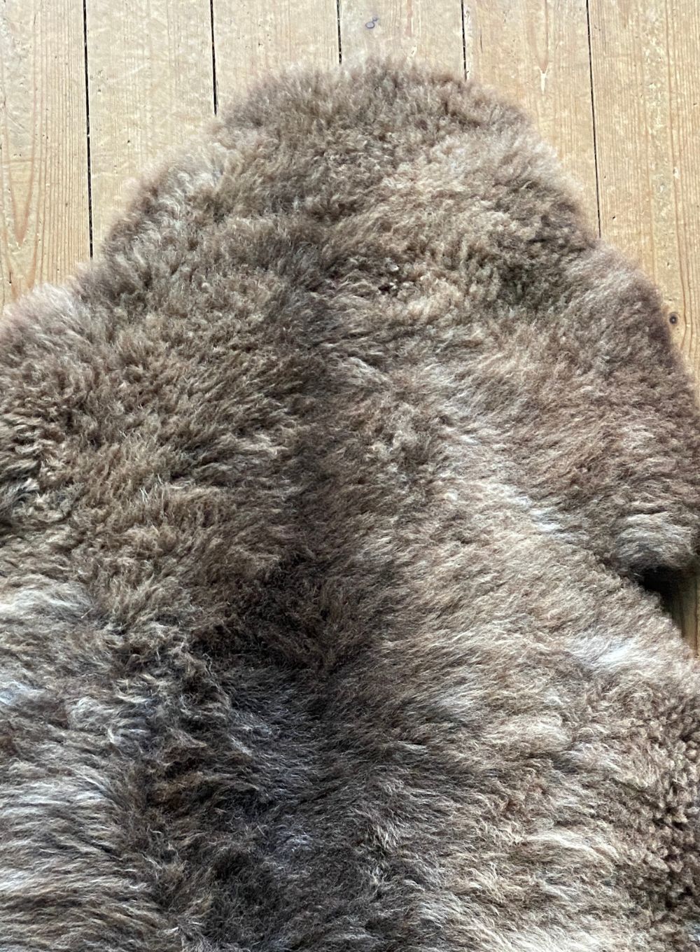 Brown sheepskin rug close up