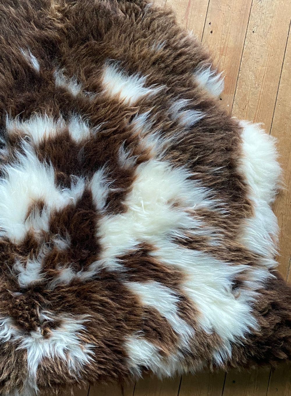 Brown and cream sheepskin rug close up