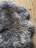 Brown sheepskin rug close up
