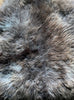 Brown sheepskin rug close up