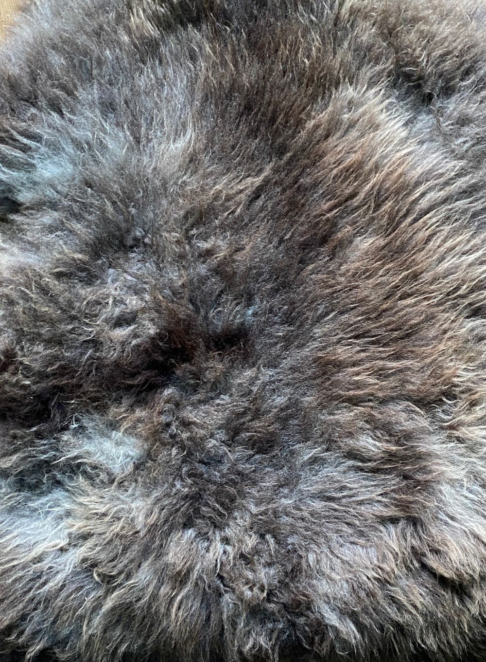 Brown sheepskin rug close up