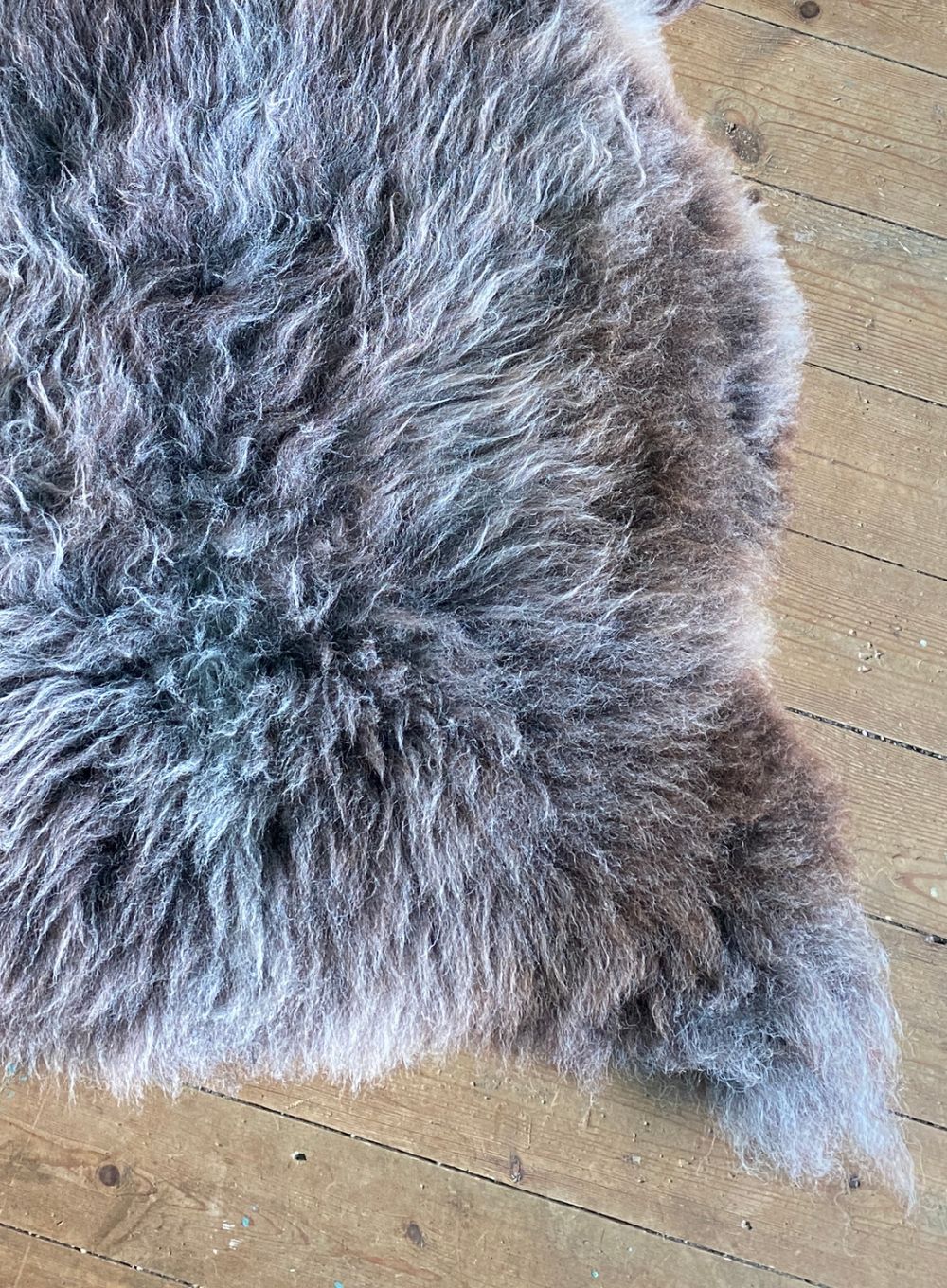 Brown and grey sheepskin rug close up