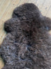 Brown sheepskin rug close up