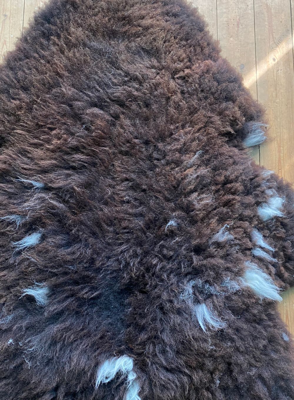 Brown sheepskin rug close up