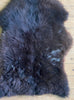 Brown sheepskin rug close up