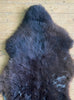 Brown sheepskin rug close up