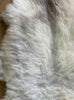 Cream sheepskin rug close up