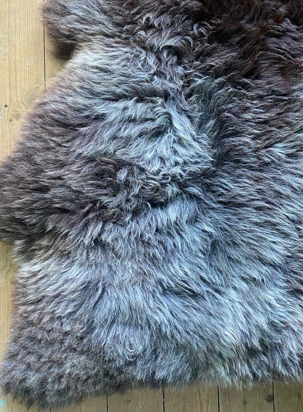 Brown and grey sheepskin rug close up