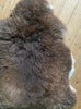 Brown sheepskin rug close up