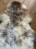 Cream speckled rug close up
