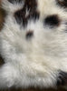 Brown and cream sheepskin rug close up