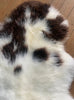 Brown and cream sheepskin rug close up
